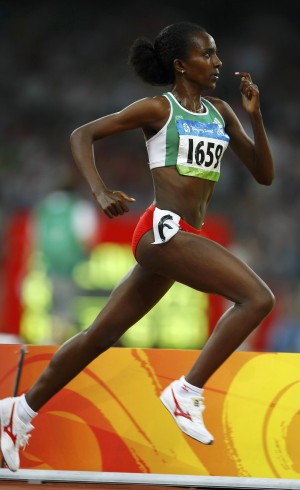 Tirunesh Dibaba of Ethiopia runs on way to winning women's 5000m final at Beijing 2008 Olympic Games